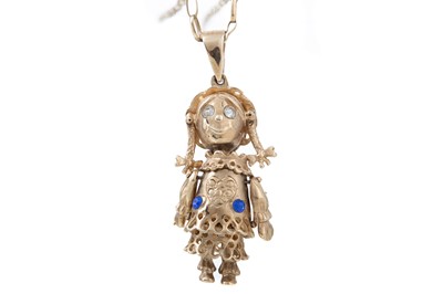 Lot 520 - ARTICULATED DOLL PENDANT