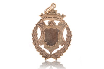 Lot 524 - NINE CARAT GOLD MEDAL