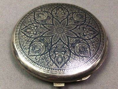 Lot 23 - SIAMESE SILVER AND ENAMEL COMPACT