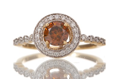 Lot 479 - TREATED ORANGE DIAMOND RING