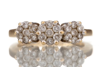 Lot 442 - DIAMOND TRIPLE DAISY CLUSTER RING