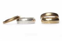 Lot 59 - THREE WEDDING BANDS two marked for nine carat...