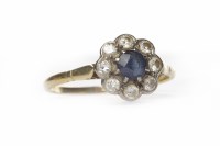 Lot 61 - SAPPHIRE AND DIAMOND CLUSTER RING the central...