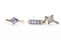 Lot 78 - TANZANITE TWO STONE RING set with marquise cut...