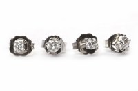Lot 80 - TWO PAIRS OF DIAMOND SINGLE STONE EARRINGS one...