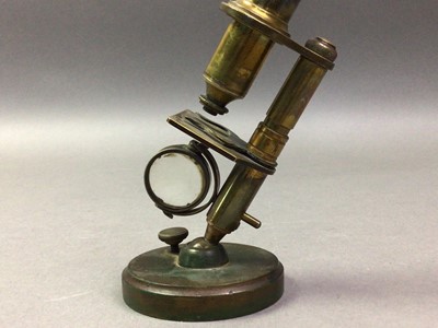 Lot 232 - EARLY 20TH CENTURY CHILD'S BRASS MONOCULAR MICROSCOPE