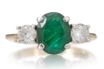 Lot 600 - EMERALD AND DIAMOND THREE STONE RING