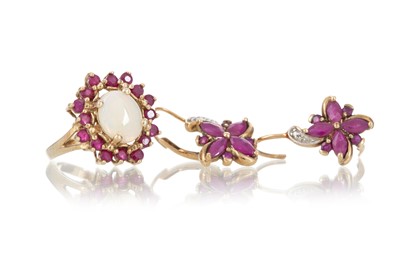 Lot 715 - RUBY AND OPAL RING