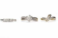 Lot 101 - THREE DIAMOND RINGS comprising a nine carat...