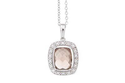 Lot 565 - SMOKY QUARTZ AND DIAMOND PENDANT