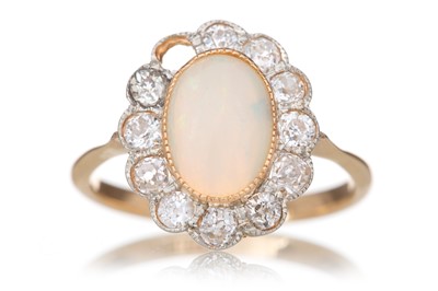 Lot 567 - OPAL AND DIAMOND RING