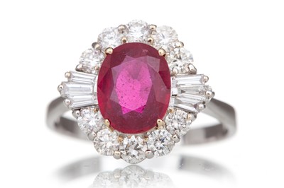 Lot 578 - GLASS FILLED RUBY AND DIAMOND RING