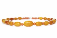Lot 109 - GRADUATED BEAD NECKLACE formed by coral beads...