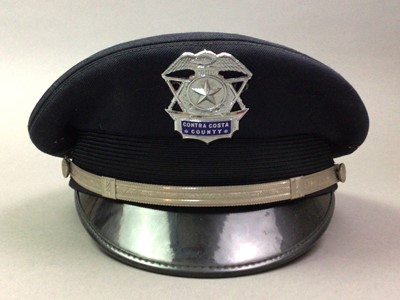 Lot 80 - NORTH AMERICA, COLLECTION OF POLICE HATS