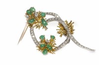 Lot 148 - DIAMOND AND EMERALD SPRAY BROOCH set with...