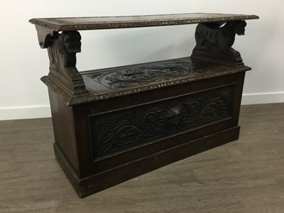 Lot 576 - CARVED OAK MONKS BENCH