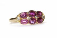 Lot 168 - RUBY AND DIAMOND DRESS RING set with six oval...