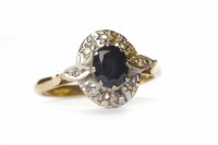 Lot 197 - SAPPHIRE AND DIAMOND CLUSTER RING the oval...