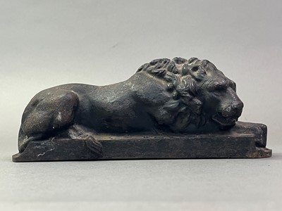 Lot 289 - CAST IRON MODEL OF A LION