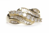 Lot 221 - DIAMOND DRESS RING with rows of channel set...