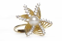 Lot 225 - UNMARKED PEARL AND PASTE SET RING the star...