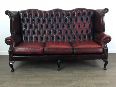 Lot 372 - OXBLOOD WINGBACK CHESTERFIELD SETTEE