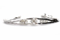 Lot 251 - FOURTEEN CARAT WHITE GOLD DIAMOND SET BRACELET...