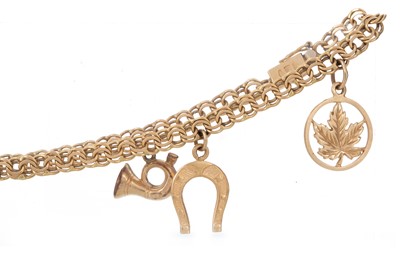 Lot 1257 - GOLD CHARM BRACELET