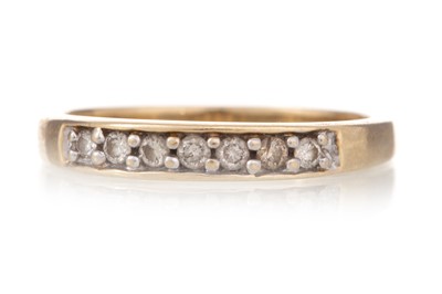 Lot 1275 - DIAMOND SEVEN STONE RING