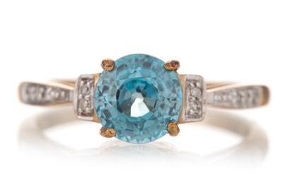 Lot 1294 - BLUE ZIRCON AND DIAMOND RING