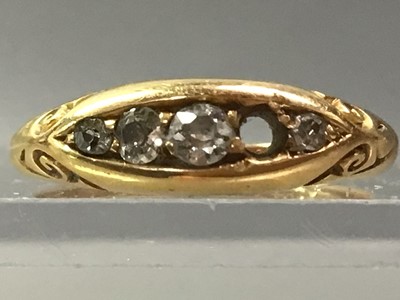 Lot 566 - DIAMOND SET EIGHTEEN CARAT GOLD RING