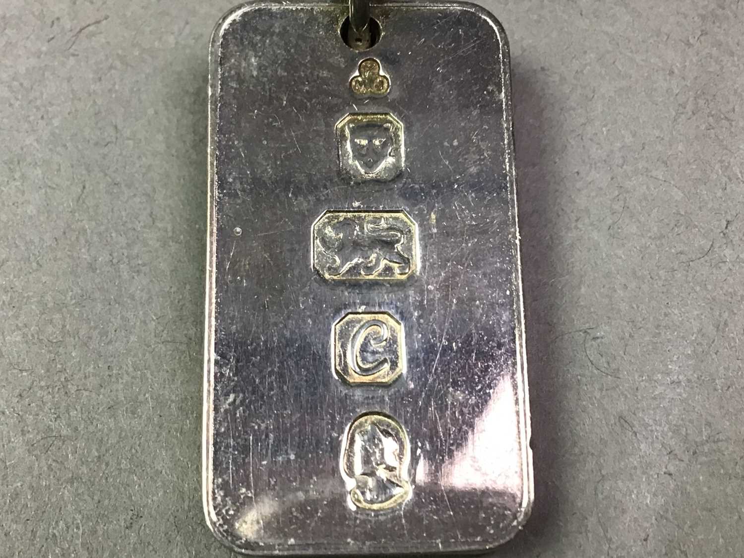 Lot 564 - SILVER INGOT PENDANT