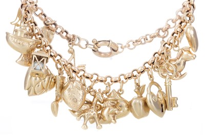 Lot 1299 - GOLD CHARM BRACELET