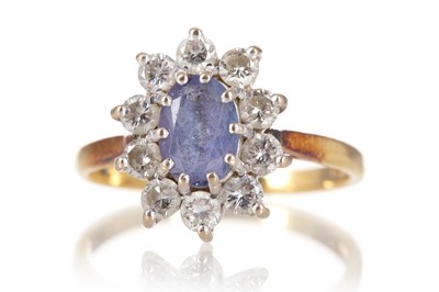 Lot 1309 - TANZANITE AND DIAMOND RING