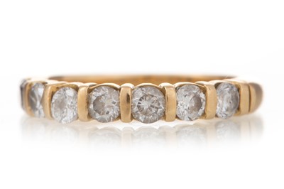 Lot 1310 - DIAMOND SEVEN STONE RING