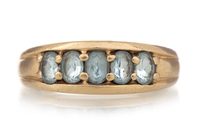 Lot 1312 - AQUAMARINE FIVE STONE RING