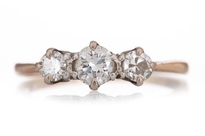 Lot 444 - DIAMOND THREE STONE RING