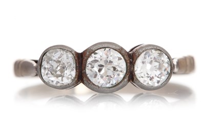 Lot 446 - DIAMOND THREE STONE RING