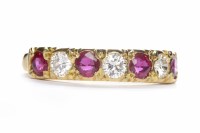 Lot 315 - EIGHTEEN CARAT GOLD RUBY AND GEM SET RING size...