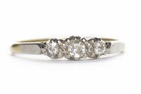 Lot 360 - DIAMOND THREE STONE RING the round diamonds in...