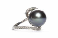 Lot 369 - BLACK PEARL SET RING the single spherical...