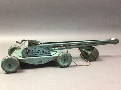 Lot 524 - DIE-CAST MODEL OF A METAL TOY CRANE