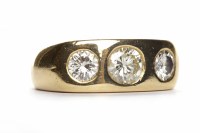 Lot 376 - EIGHTEEN CARAT GOLD DIAMOND THREE STONE RING...