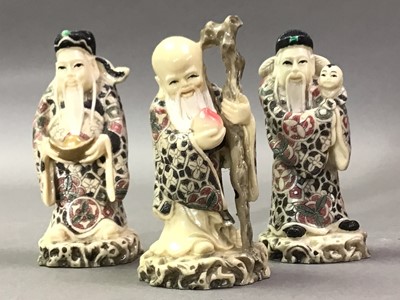 Lot 497 - THREE RESIN FIGURES OF CHINESE IMMORTALS