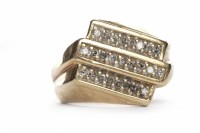 Lot 390 - GENTLEMAN'S NINE CARAT GOLD GEM SET RING with...