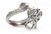 Lot 401 - FOURTEEN CARAT WHITE GOLD DRAGON MOTIF RING...