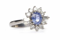 Lot 410 - SAPPHIRE AND DIAMOND CLUSTER RING in eighteen...