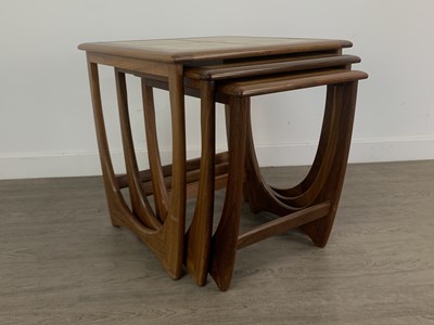 Lot 336 - VICTOR WILKINS (BRITISH, 1878-1972) FOR G-PLAN, 'ASTRO'  TEAK NEST OF THREE TABLES