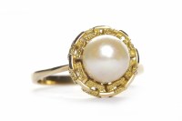 Lot 464 - UNMARKED PEARL SET RING the round pierced...