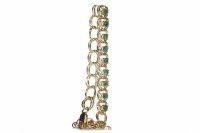 Lot 465 - FOURTEEN CARAT GOLD GREEN GEM SET BRACELET set...